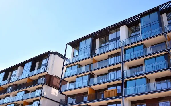 depositphotos_362289910-stock-photo-modern-new-apartment-building-sunny