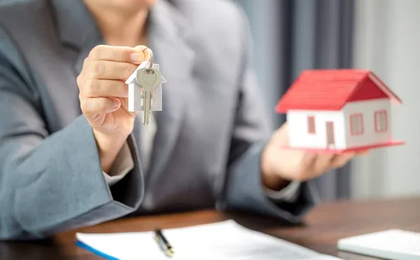 depositphotos_609193402-stock-photo-woman-home-sales-person-checking