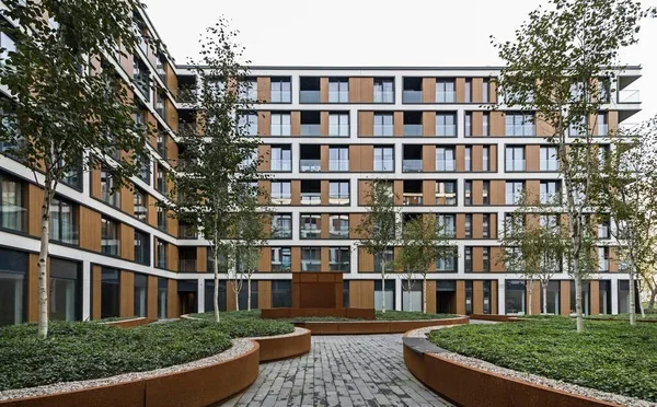 depositphotos_649803232-stock-photo-residential-buildings-european-city-modern